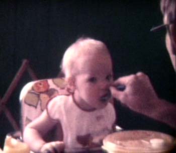 1976_04_00_Tamara learns to hold spoon009