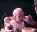 1976_04_00_Tamara learns to hold spoon009